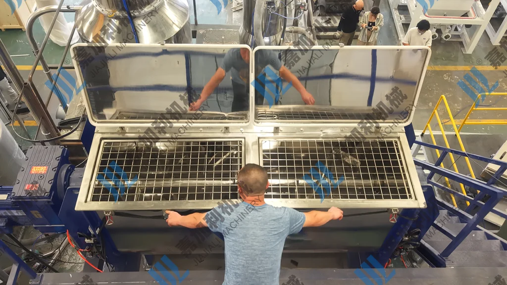Industrial mixer for uniform feed ingredient mixing
